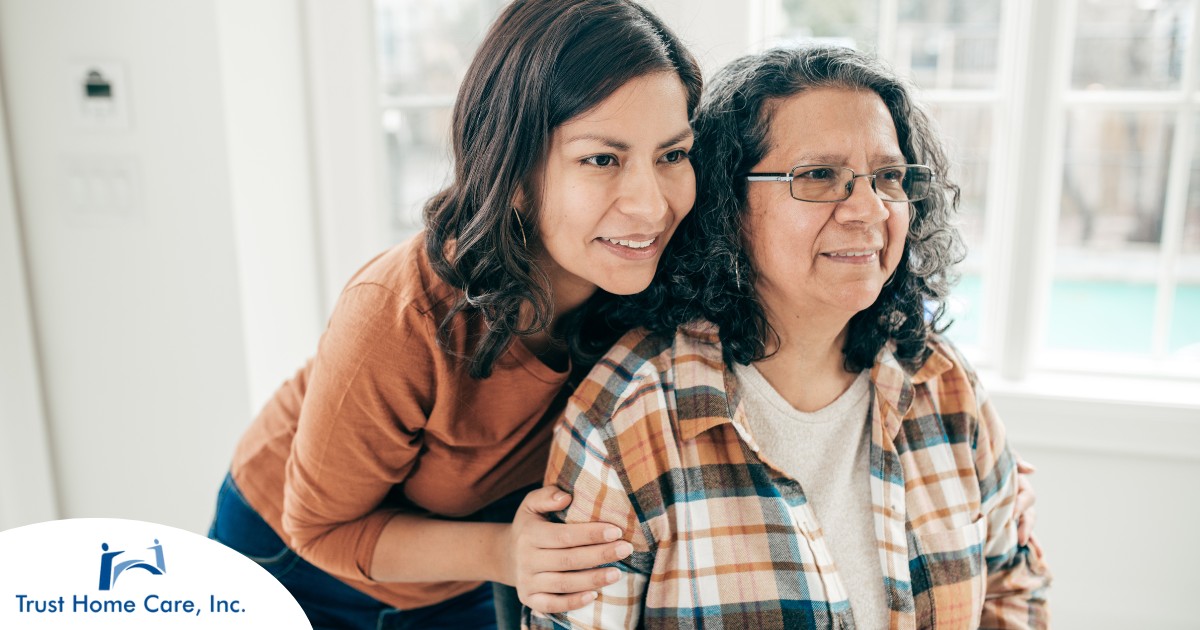 A woman hugs her older mother, representing compassionate senior care