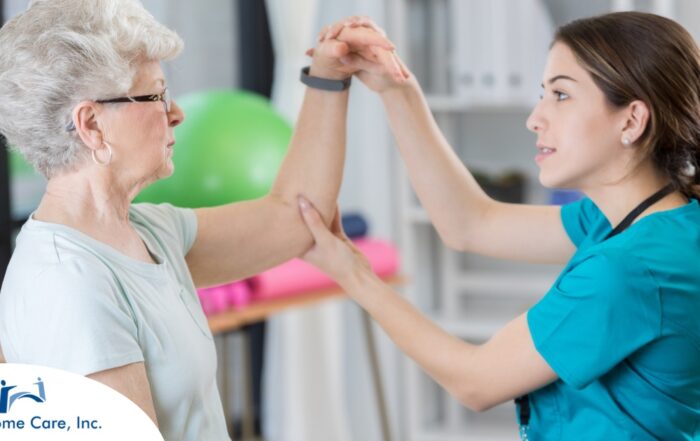 A physical therapist helps a senior patient, representing what National Physical Therapy Month aims to highlight.