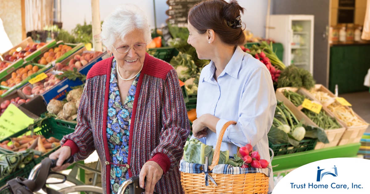 Diabetes-Friendly-Grocery-Shopping-Tips-for-Seniors A caregiver shops for groceries with an older adult, representing shopping for a diabetes-friendly diet.