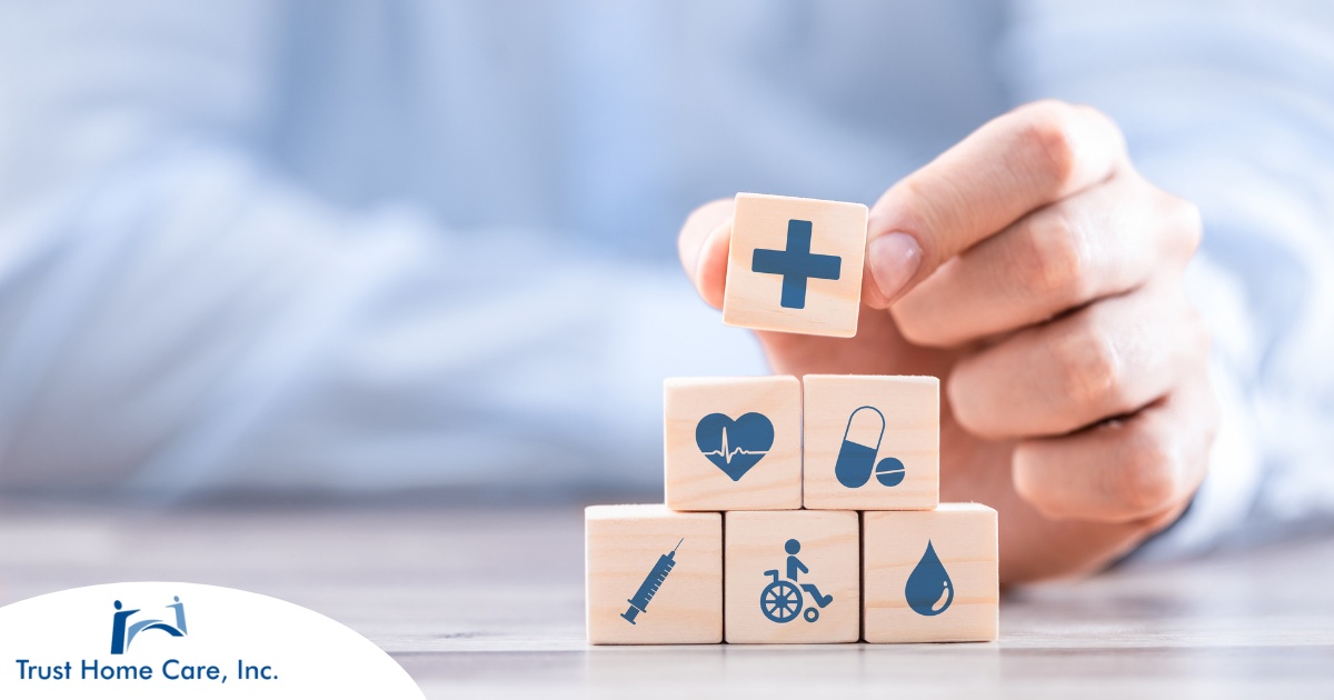 Home-Health-Care-and-Insurance-What-You-Need-to-Know A stack of block with different health related icons represents health insurance which can help with home health care.