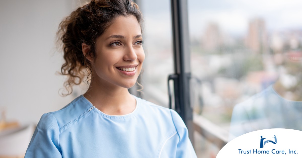 How-to-Take-Control-of-Your-Home-Care-Career-with-Strategic-Planning A woman smiles while looking ahead hopefully, showing the positive outlook that planning for a home care career can bring.