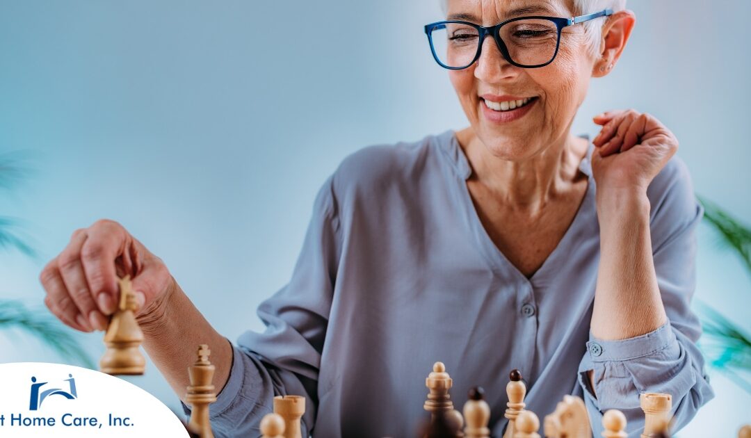 An older woman plays chess, an activity that can help older adults stay sharp.