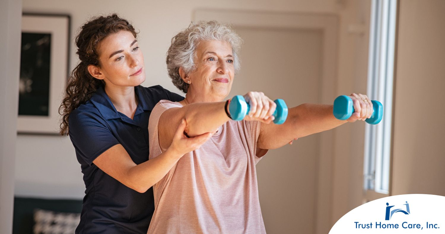 Supporting-Stroke-Recovery-at-Home-The-Role-of-Home-Health-Agencies A physical therapist helps an older patient lift weights, representing how home health professionals can help with the hospital to home transition and the recovery that it entails.