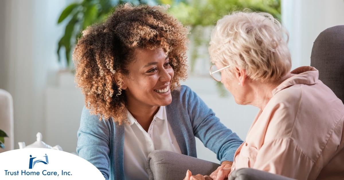 The-Benefits-of-Bilingual-Care-Why-Speaking-Your-Clients-Language-is-a-Game-Changer A caregiver warmly speaks with an older client, representing the quality communication that can come with bilingual care.