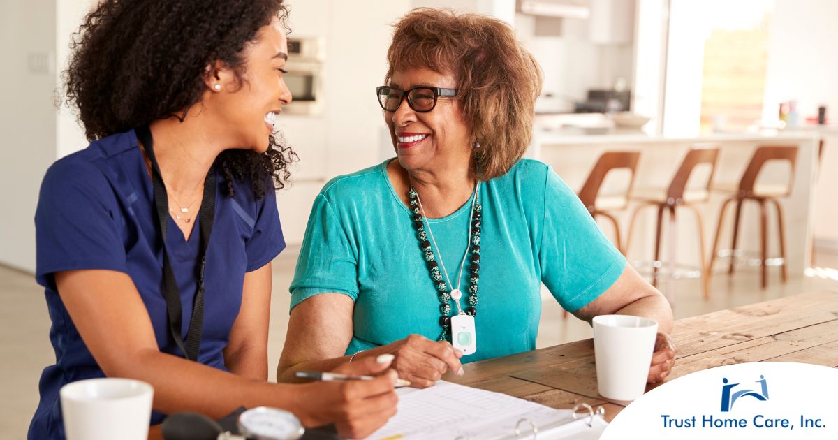 The-Power-of-Speech-Therapy-for-Seniors-Living-with-Aphasia-or-Dysarthria A care provider smiles with an older patient, representing the good results of speech therapy.