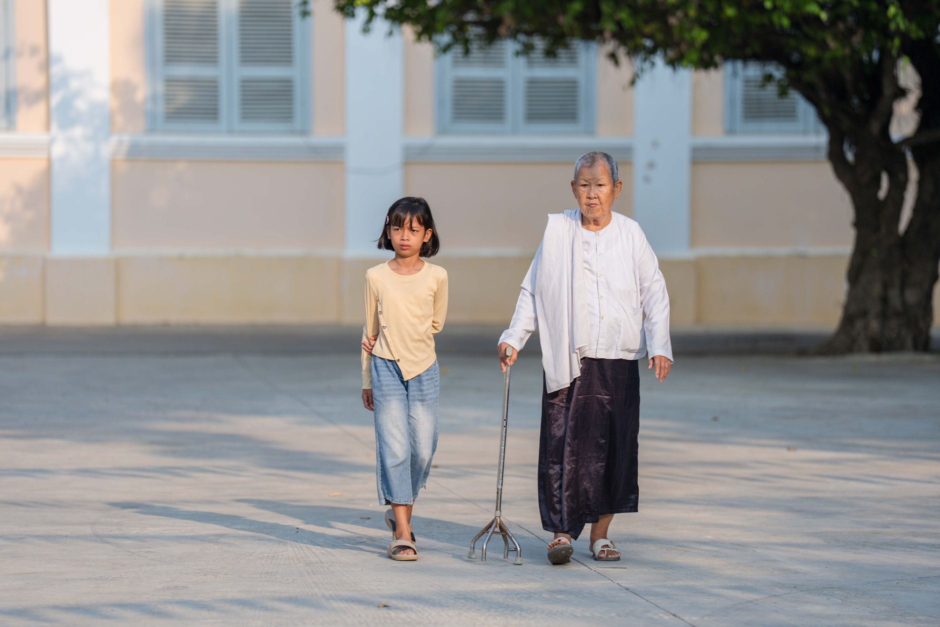 A senior enjoying companionship and steady mobility support during aged care in Sterling, VA