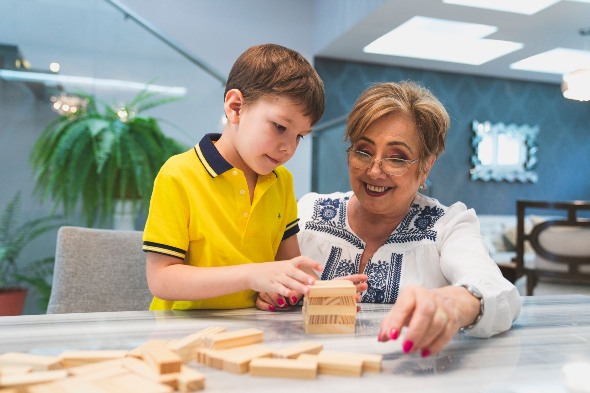 A senior enjoying a shared game and activity time as part of companion care in Sterling, VA