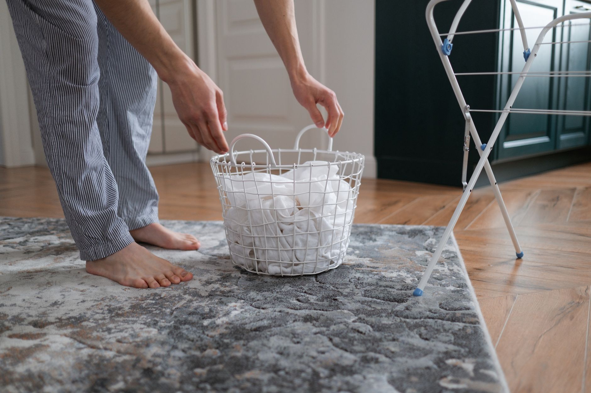 A caregiver handling laundry and light housekeeping during home help in Sterling, VA