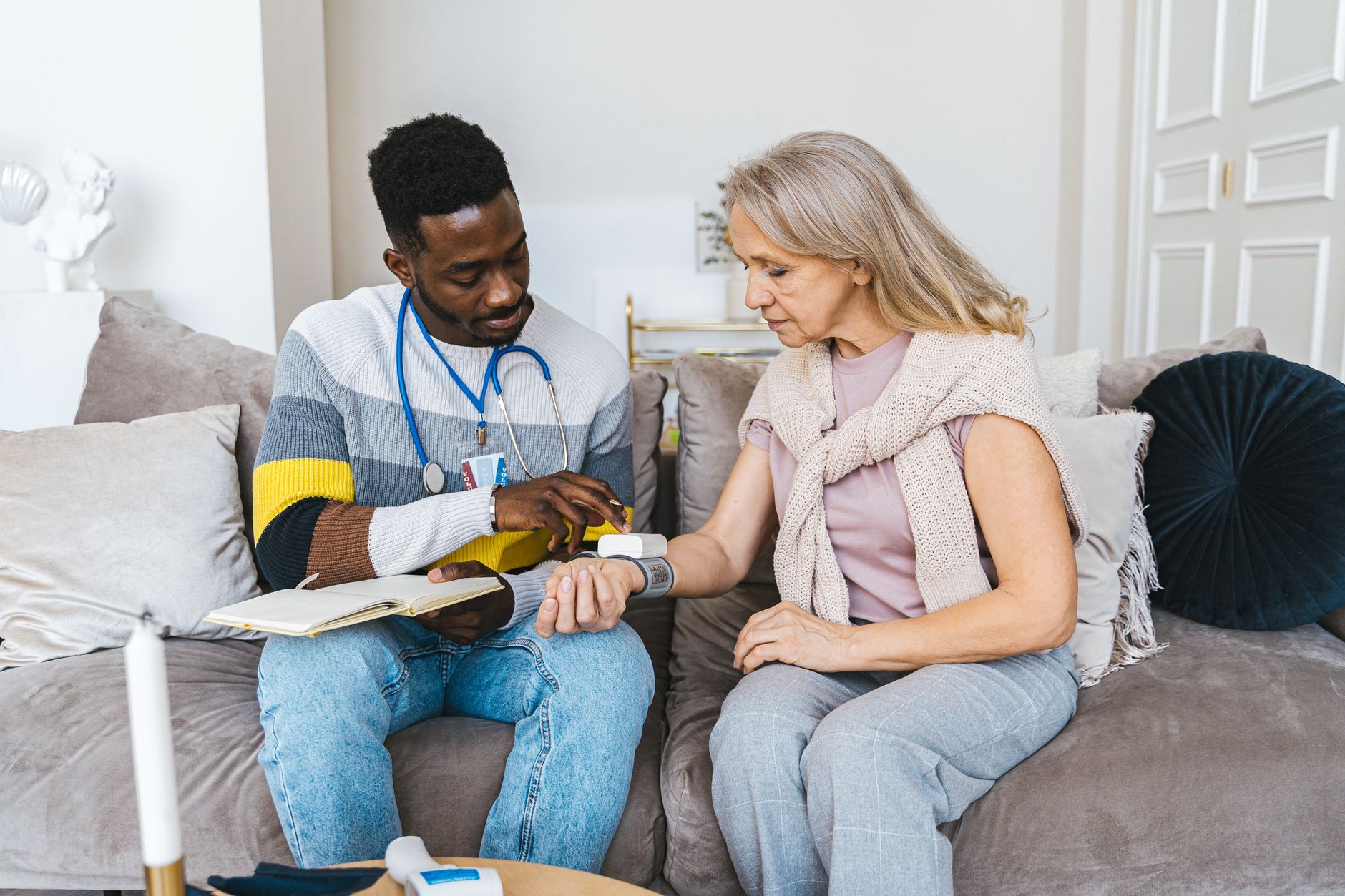A caregiver providing personalized dementia care to a senior at home in Sterling, VA