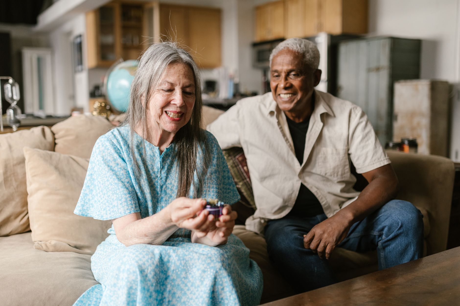A senior enjoying a light, engaged moment with a companion during respite care in Sterling, VA