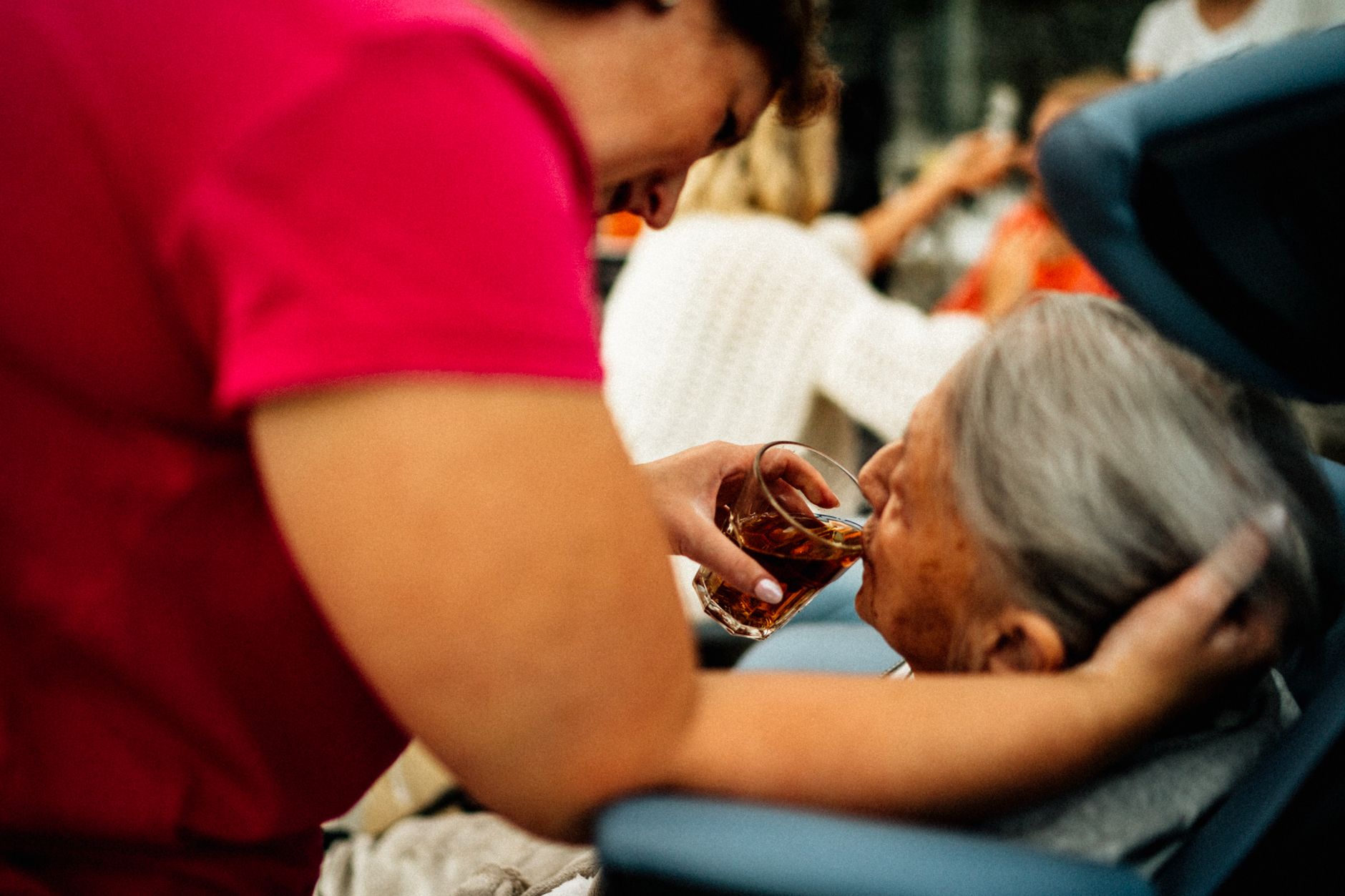A caregiver providing warm personal support to a senior woman at home in Sterling, VA